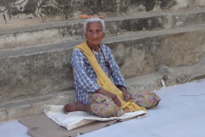 Old woman by the temple